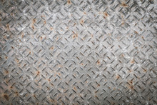 Old Metal Floor Plate With Diamond Pattern And Rusty Background Texture.