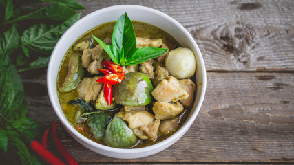 Wall Mural - Thai Chicken Green Curry. Famous Thai Tradition Food. Image for Food Advertise in Nostalgic Concept and Rustic Vintage Tone