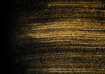 Gold explosion glitter texture isolated on black background.