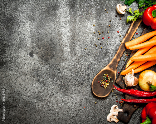 Naklejka na kafelki Fresh vegetables . Fresh vegetables with spices and herbs. On rustic background.