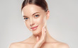 © Sofia Zhuravetc - Beautiful Young Woman with Clean Fresh Skin touch own face . Facial treatment . Cosmetology , beauty and spa