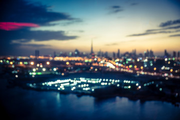 Blurred aerial view of Dubai at night time