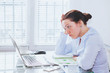 © Song_about_summer - angry furious woman in modern business office looking at screen of laptop computer, anger, annoyed businesswoman