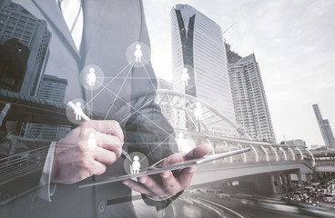Poster - Double exposure of success businessman using digital tablet with social media network diagram,internet concept