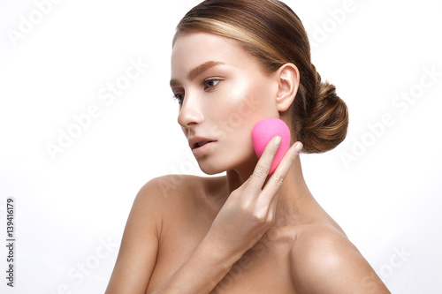 Fotografie, Obraz Young girl with a healthy skin and Nude makeup