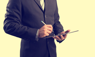 Poster - Business man working with a digital tablet.