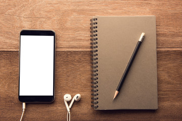 Aufkleber - Smartphone with white screen and Note book On Wooden Table With Copyspace