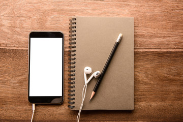 Aufkleber - Smartphone with white screen and Note book On Wooden Table With Copyspace