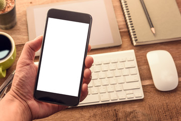 Aufkleber - hand holding smart phone with blank white screen top view