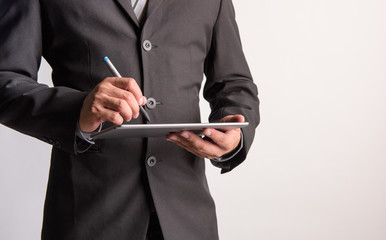 Poster - Business man working with a digital tablet