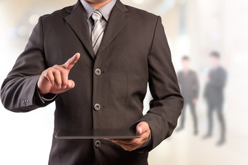 Poster - Business man working with a digital tablet