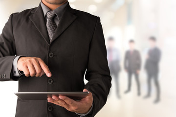 Poster - Business man working with a digital tablet