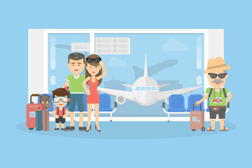 Wall Mural - Family in the airport. Parents with boy and grandfather stand near the window in waiting room with luggage. Family journey.