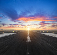 Airport Runway In The Evening Sunset Light