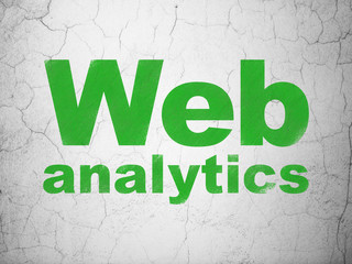 Web development concept: Web Analytics on wall background