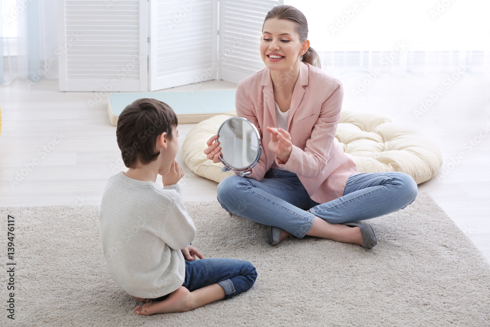 Cute little boy at speech therapist office