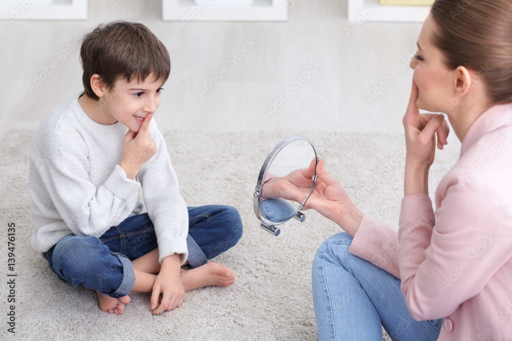 Cute little boy at speech therapist office