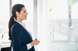 © baranq - Happy business woman working on white board in office