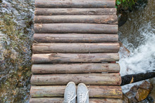 Top View Gray Sneakers On Wooden Bridge Over River, Hipster Style