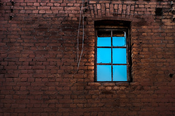 Window at the brick wall