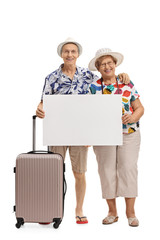 Poster - Mature tourists with a suitcase holding a blank signboard