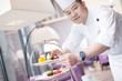 © zhu difeng - young man chelf makes food