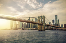 Manhattan Skyline With Brooklyn Bridge, New York City, USA, With Lens Flare