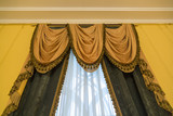 Fototapeta Paryż - Heavy curtains made of thick fabric. Window decoration idea