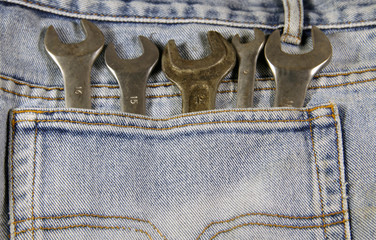 Wall Mural - Wrench tools in the pocket jeans