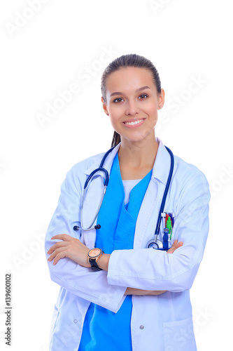 Woman doctor with stethoscope standing with arms crossed isolated on a white bac Lerretsbilde