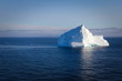 Iceberg floating in calm ocean