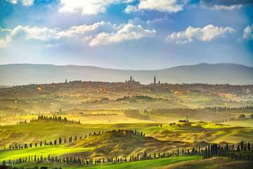 Wall Mural - Siena city skyline, countryside and rolling hills. Tuscany, Italy