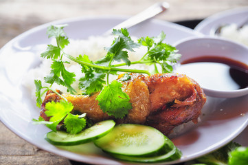 Wall Mural - Vietnamese broken rice or com tam with fried chicken legs, pork and herbs