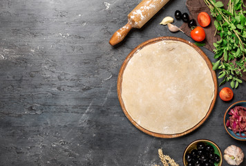 Poster - Raw pizza dough with ingredients for cooking vegetarian pizza