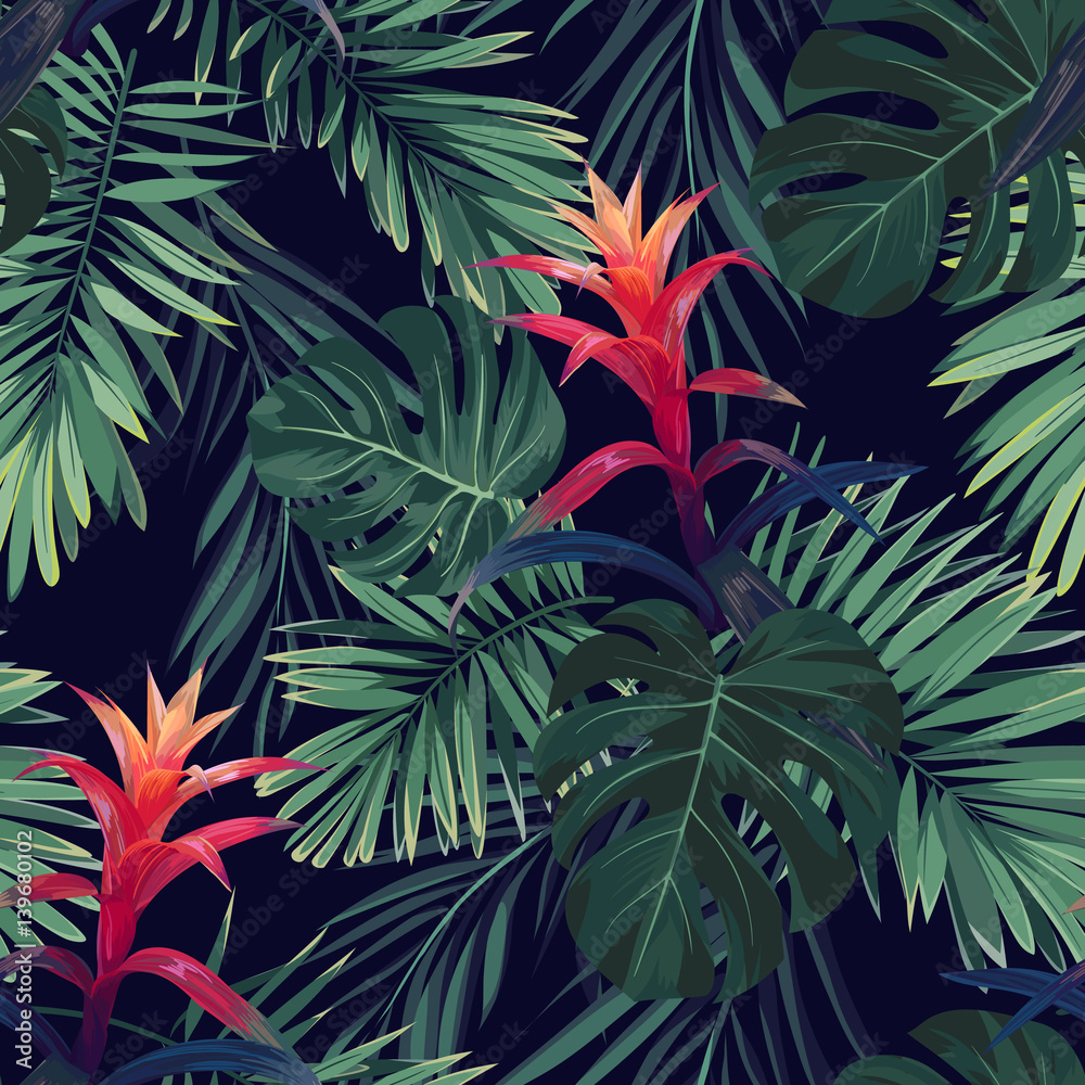 czerwone-kwiaty-guzmania-z-liscmi-palm-krolewskich