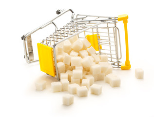 Canvas Print - Turned pushcart with pile of white sugar