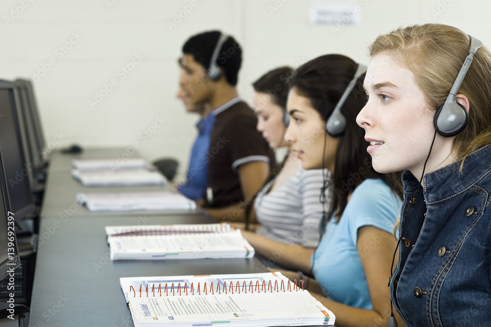 Students learning in computer lab Stock Photo | Adobe Stock