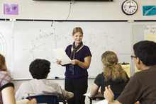 Woman Teaching High School Mathematics Class