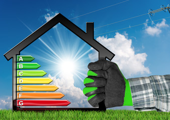 Wall Mural - Energy Efficiency - House Model with energy efficiency rating on blue sky with sun rays