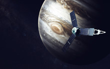 Juno Spacecraft And Jupiter. Elements Of This Image Furnished By NASA