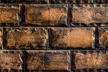 Background of brick wall black and brown colors