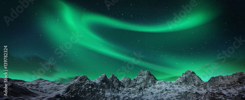 Cuadros en Lienzo Aurora borealis above snowy islands