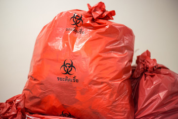 biological waste, red biohazard garbage bag