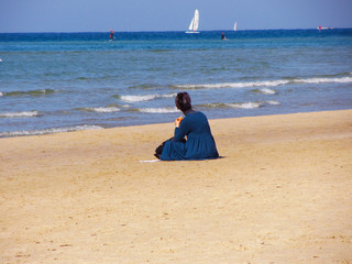 Woman watching the sea