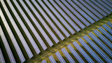 Fototapeta Londyn - Solar energy farm. High angle, elevated view of solar panels on an energy farm in rural England; full frame background texture.