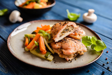 Sticker - Roasted chicken breasts stuffed with mushrooms, cheese and egg, garnished with steamed vegetable