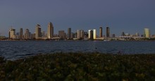 SAN DIEGO, CA - Circa February, 2017 - A Picturesque Wide Slow Dollying Establishing Shot Of The San Diego Skyline At Dusk.	 	