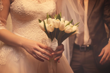 Wall Mural - Bride in beautiful dress holding wedding bouquet