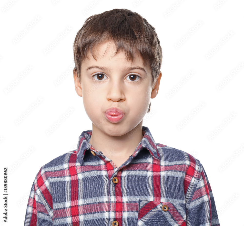 Portrait of cute little boy on white background