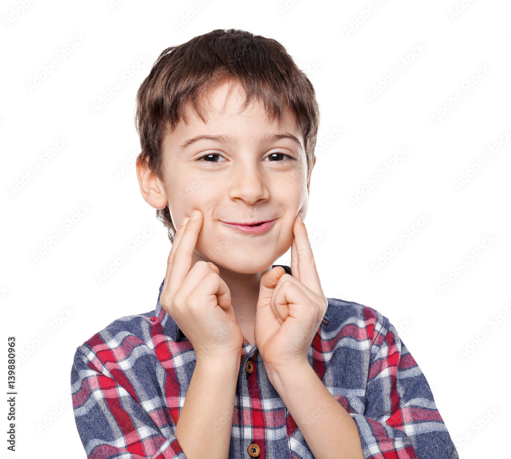 Portrait of cute little boy on white background